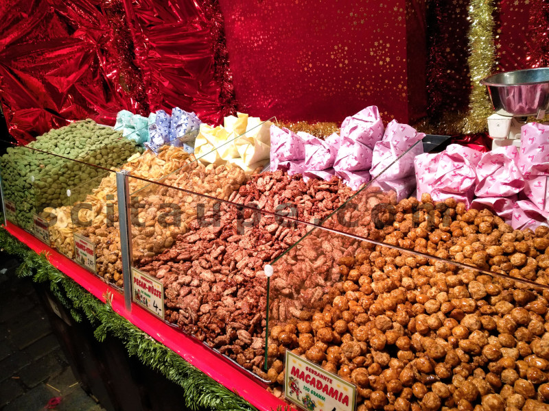 A wide variety of Gebrannte Nüsse for sale at a stall in Nuremberg Christkindlmarkt, Germany