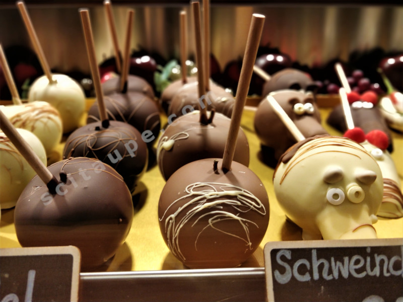 Christkindlesmarkt: White, Dark or Milk Chocolate dipped fruits for sale. Grab your piece!