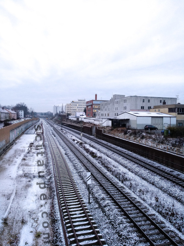 Last night's snow sprinkled on the rail tracks 