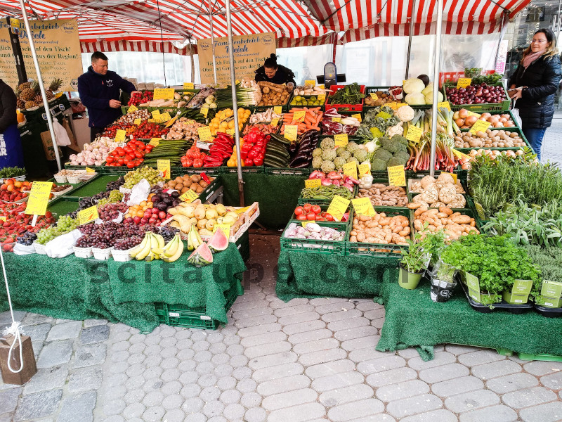 A fresh produce stall selling Winter Vegetables and Fruits in Germany ready for your pans and ovens.